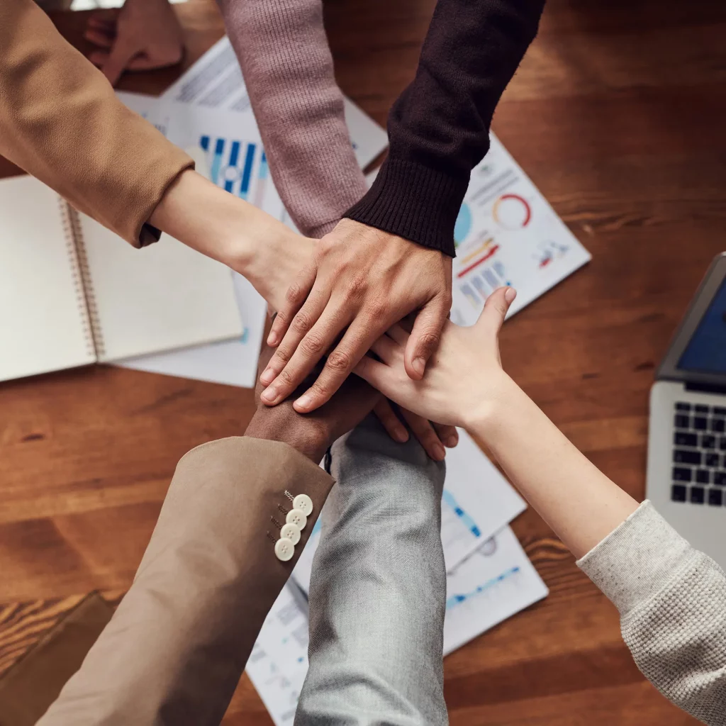 Photo of People Near Wooden Table Free stock photo (pexels.com)