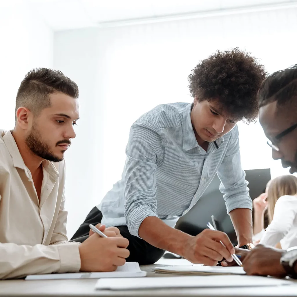 2 Men In White Dress Shirts Sitting At Table Free stock photo (pexels.com)