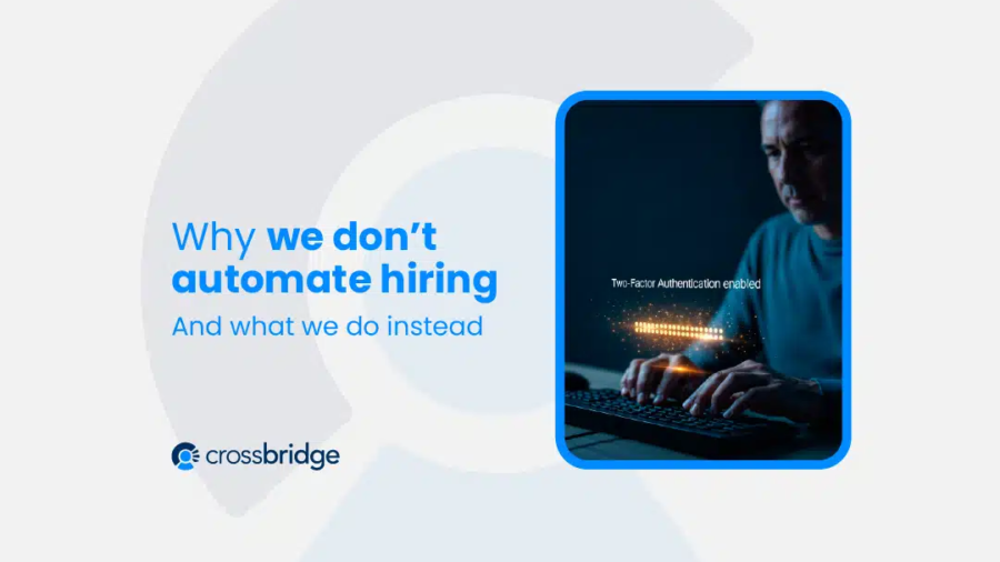 Recruiter evaluating candidates next to AI tool, showing why don’t automate hiring completely
